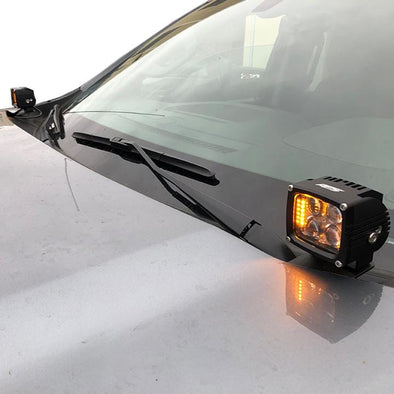 An image of an APS accent light mounted on the hood of a 2019 Chevy Silverado